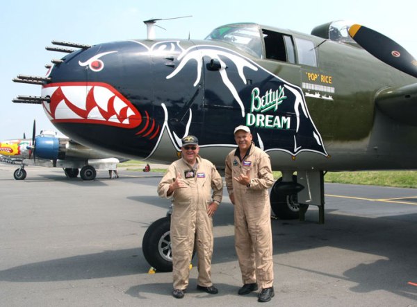 Co-pilot Bill Miller (left) and pilot Alan Miller pose in front of Betty’s Dream in May 2015 after a practice run for the Arsenal of Democracy Flyover. (Photo: K. Daniel Glover)